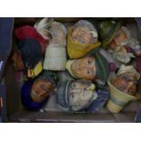 A collection of Bossons plaster wall masks