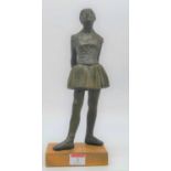 After Edgar Degas, a bronzed model of The Little Dancer, mounted upon a beech plinth, height 32.5cm