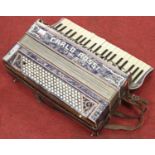 An Italian Carlo Rossi piano accordion, 52cm