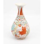 A Chinese vase having flared rim to slender neck and teardrop shaped body decorated with various