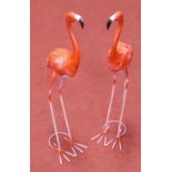 A pair of painted metal flamingoes, h.69cm