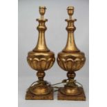 A pair of gilt wood table lamps, each of baluster form, height 61cm