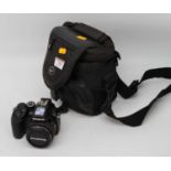 An Olympus SP-570UZ10 megapixel digital camera with carry case