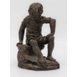 A 20th century bronzed model of a boy, seated, height 18cm