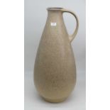 A West German pottery vase, having a mottled beige glaze, h.60cm