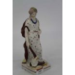 A 19th century Staffordshire pearlware figure of Peace in standing pose with flaming torch in