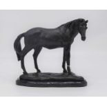 A bronze model of a horse, shown in standing pose, mounted upon a polished black hardstone plinth,