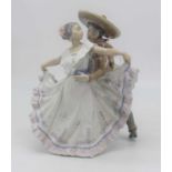 A Lladro porcelain figure group of two dancers, h.30cmRepair to body of lady. Repair to man’s