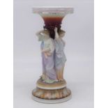 A continental figural porcelain table centrepiece, h.31cm