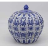 A Chinese blue and white jar and cover, of lobed form, h.26cm