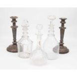 A pair of 19th century Sheffield plate table candlesticks, height 26cm; together with three glass