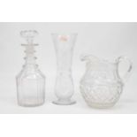 A Regency cut glass water jug, h.19cm; together with a triple ring neck decanter of mallet form; and