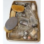 A collection of miscellaneous items, to include silver backed brushes, silver topped glass