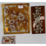 A late 19th century glass panel hand painted with flowers, 21.5 x 19cm, together with one other