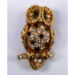 An 18ct yellow gold multi-stone owl brooch, set with 45 round brilliant cut diamonds, 15 round