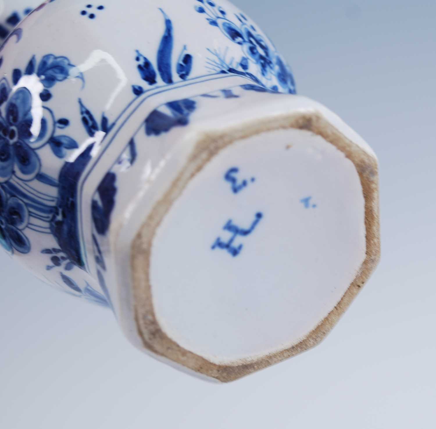 A Delft blue and white vase, 18th century, the garlic neck above a globular body, decorated with - Image 5 of 9