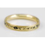 A 19th century yellow metal memorial ring inscribed Jane Porter OB 28 Sep AE 82, with black enamel