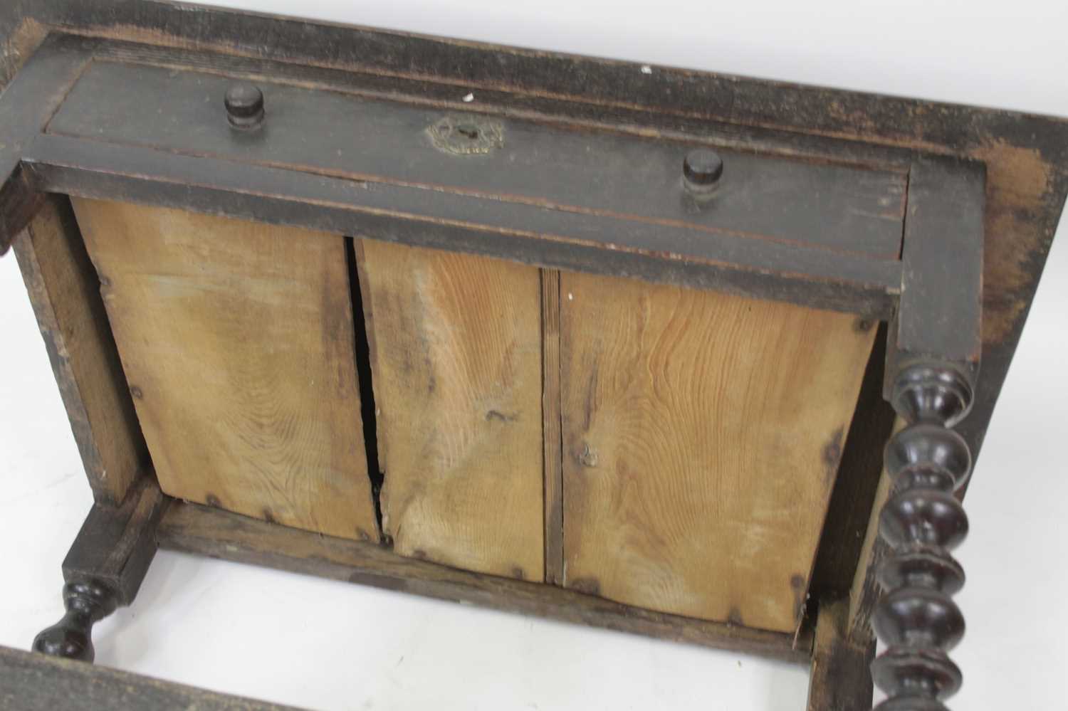 A circa 1700 joined oak single drawer side table, having a two-plank top and raised on bobbin turned - Image 4 of 4