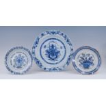 An English blue and white delftware charger, probably Vauxhall, circa 1730, decorated with a vase of