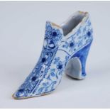 An English blue and white delftware shoe, probably London or Bristol, circa 1730, decorated with