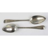 A pair of George III silver table spoons. in the Old English pattern with bright cut engraved