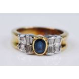 A yellow and white metal, sapphire and diamond dress ring, having a centre oval sapphire in a semi-