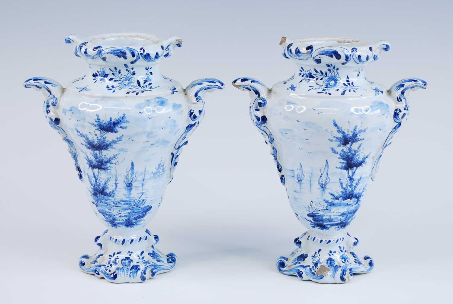 A pair of Delft blue and white vases, late 17th/18th century, each of wrythen form, flanked by C- - Image 7 of 8