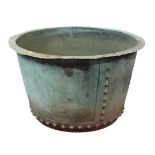 An extremely large, circa 1900, copper log bucket of circular form with riveted construction,