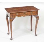 An 18th century Dutch walnut and floral marquetry single drawer side table, having a two-plank