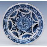 An English blue and white delftware dish, probably Brislington, circa 1670, decorated with geometric