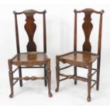 A pair of late 18th century North Country elm and ash dining chairs, each having solid vase
