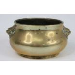 A Chinese gilt bronze censer, having applied Fo Dog mask mounts, the base with Xuande six