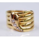 A late Victorian 18ct yellow gold diamond set snake ring, featuring five graduated Old European