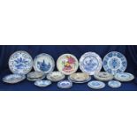 A collection of Delft polychrome and blue and white chargers and plates, 20th century, to include