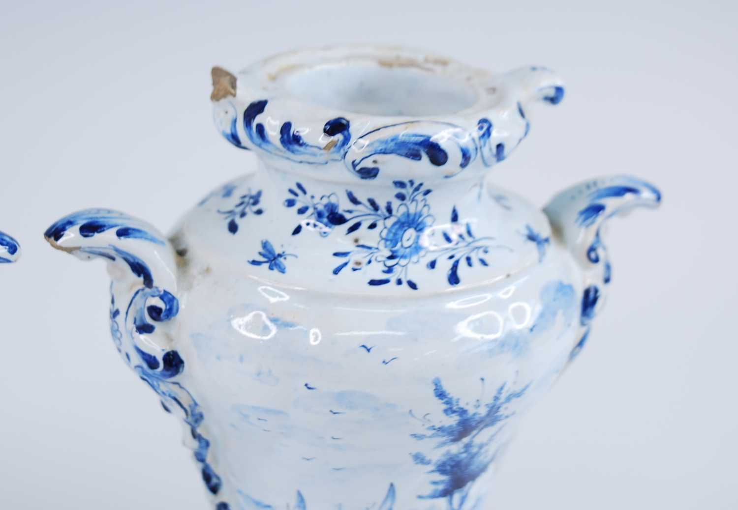 A pair of Delft blue and white vases, late 17th/18th century, each of wrythen form, flanked by C- - Image 8 of 8