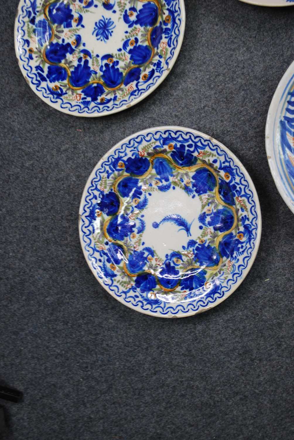 A collection of five Spanish polychrome glazed earthenware dishes, to inlcude Manises examples, 19th - Image 7 of 7