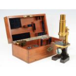 A Carl Zeiss Jena No.11683 lacquered brass microscope, with some spare lenses and in original