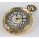 A French lady's 18ct gold cased open face pocket watch, having a jewelled white enamel dial with