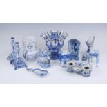 A collection of Delft blue and white items, each a reproduction of an 18th century design, 20th