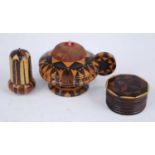 A Victorian rosewood miniature pin cushion, of squat circular form having a cushion top above a