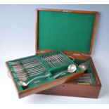 A cased Edwardian silver cutlery suite, in the Hanoverian pattern, comprising serving spoon,