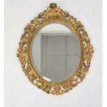 A 19th century Italian Florentine gilt composition picture frame, having later inset bevelled oval