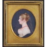 19th century English school, profile portrait of a young woman wearing a coral necklace, miniature