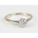 An 18ct white gold diamond solitaire ring, featuring a round brilliant cut diamond in an eight-