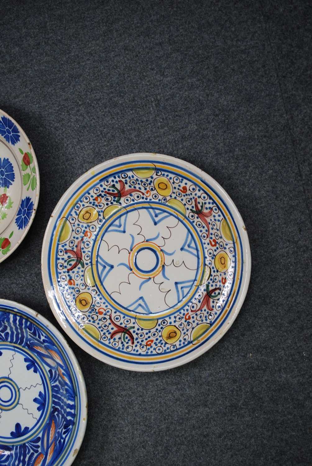 A collection of five Spanish polychrome glazed earthenware dishes, to inlcude Manises examples, 19th - Image 3 of 7