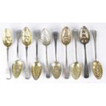 A pair of George III silver tablespoons in the Old English pattern, each with later embossed and