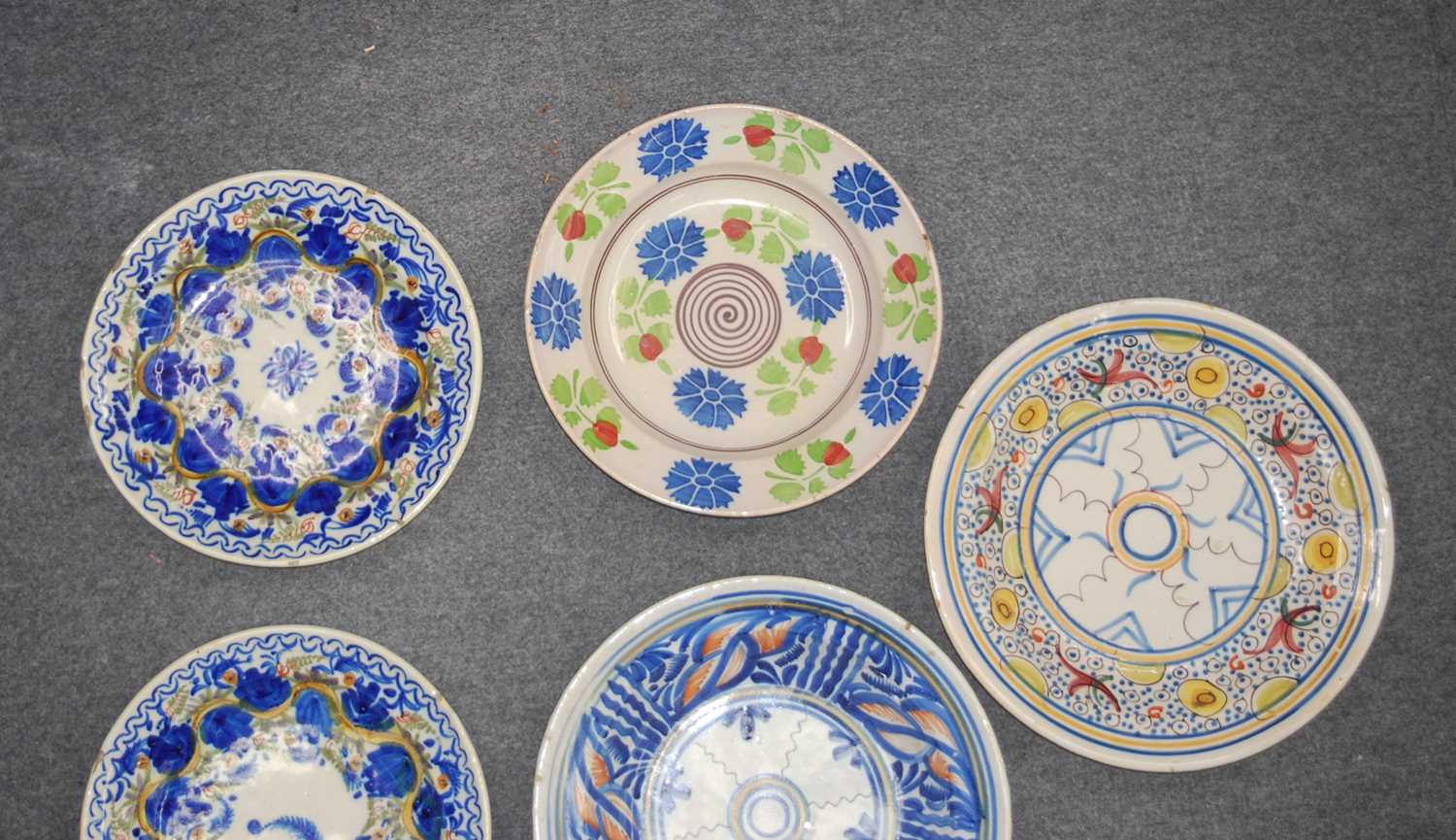 A collection of five Spanish polychrome glazed earthenware dishes, to inlcude Manises examples, 19th - Image 2 of 7