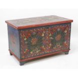 A Swedish painted pine blanket chest, the whole polychrome decorated with leaves and flowers