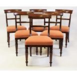 A set of seven William IV mahogany bar back dining chairs (5+2), together with six near matching