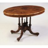 A Victorian figured and burr walnut pedestal loo table, having a four-quarter veneered oval tilt